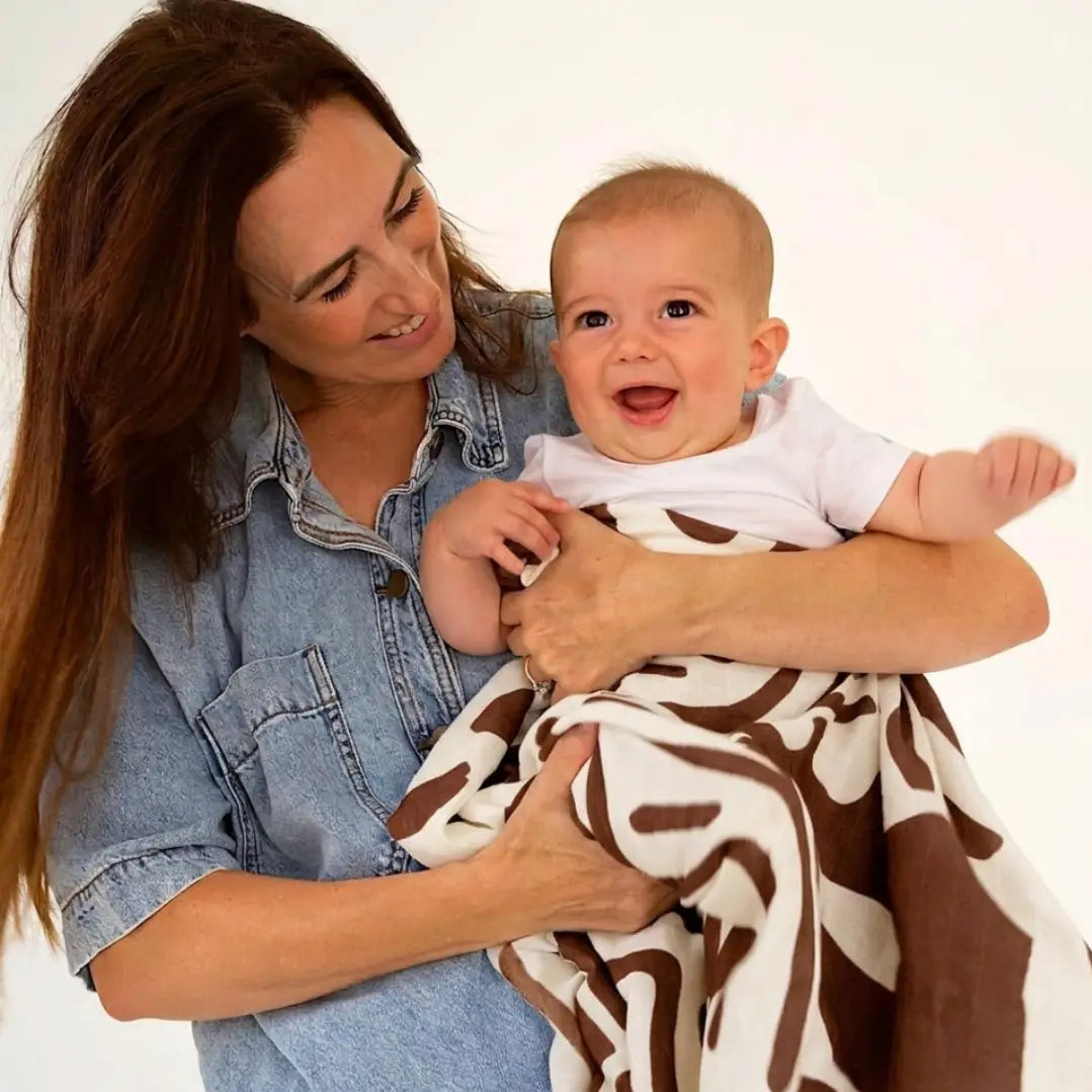 Golden Child Holiday Patterned Baby Swaddle - Choco & Milk