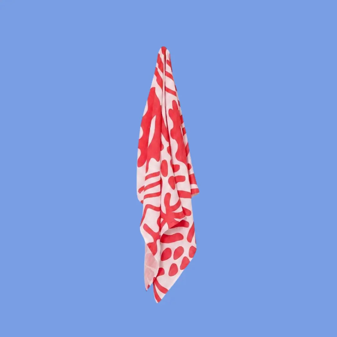 Golden Child Holiday Patterned Baby Swaddle - Red & Milk