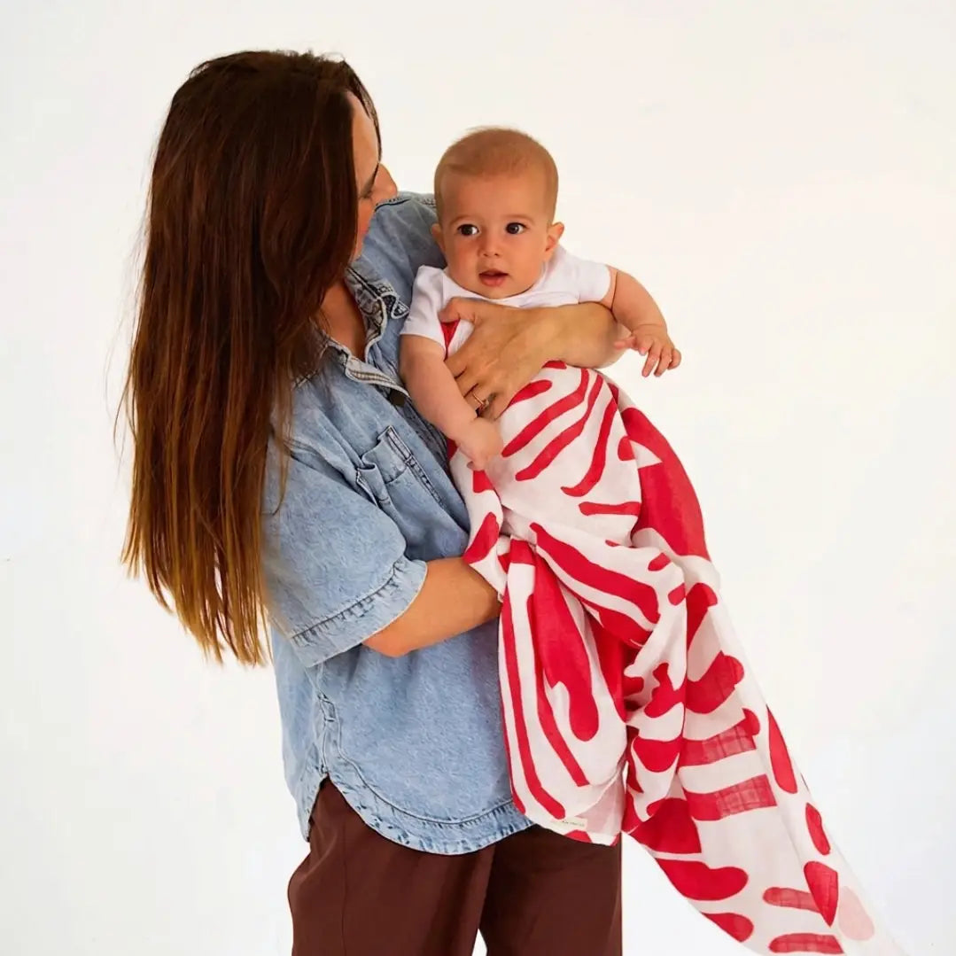 Golden Child Holiday Patterned Baby Swaddle - Red & Milk